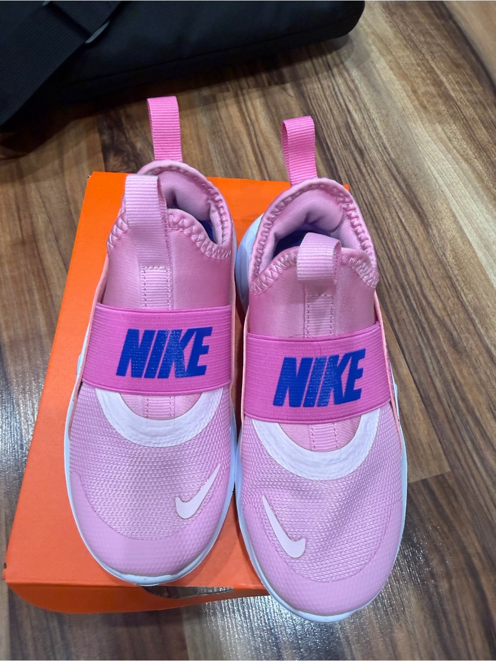 Nike Kids Pink Slip-On Sneakers with Blue Logo